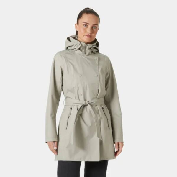 Immagine dell’impermeabile Helly Hansen Trench Wesley II da donna, un trench elegante e resistente con cappuccio removibile, chiusura con zip e bottoni, ideale per proteggersi dalla pioggia con stile. Colore terrazzo