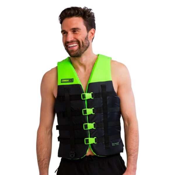 Persona che indossa il gilet salvagente Jobe Dual unisex colore Lime, in nylon Ripstop con fibbie YKK, anello a D e schiuma EPE, ideale per sport in acqua e massima sicurezza